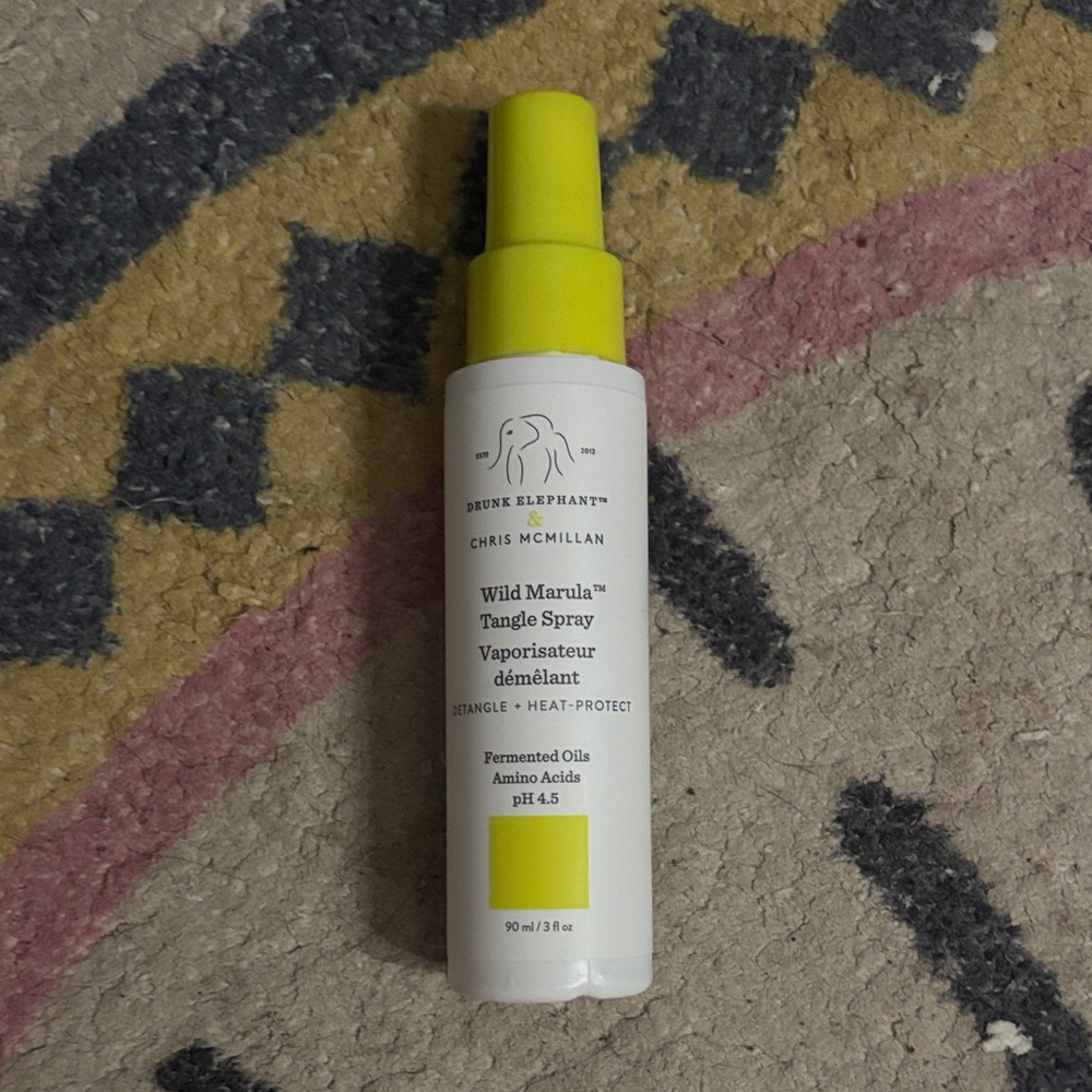 Drunk Elephant Tangle Spray with Bright Yellow Cap